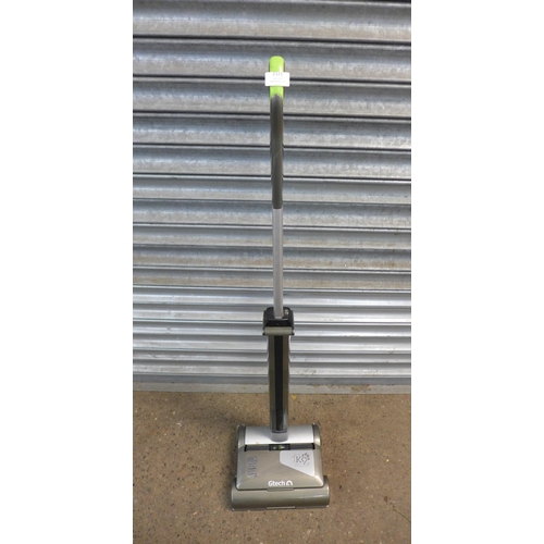 2121 - A G-Tech Air Ram K9 cordless stick vacuum and a H2O HD steam mop