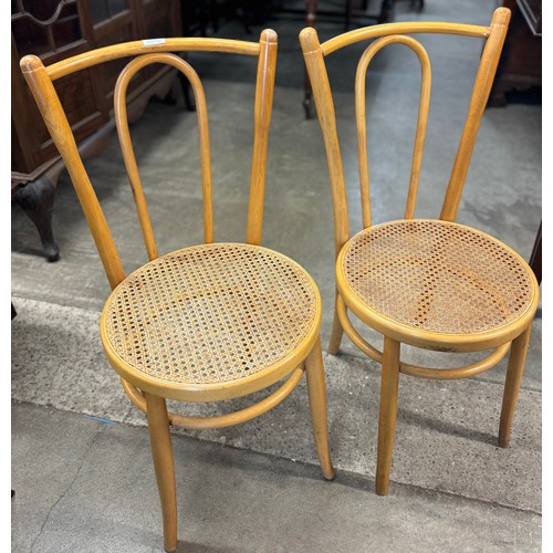 176 - A pair of beech bentwood chairs