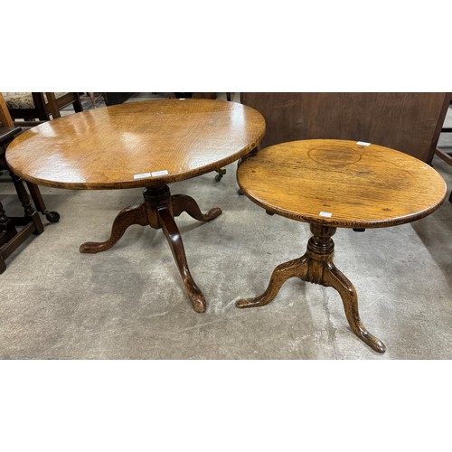 208 - Two George III oak circular tripod tables