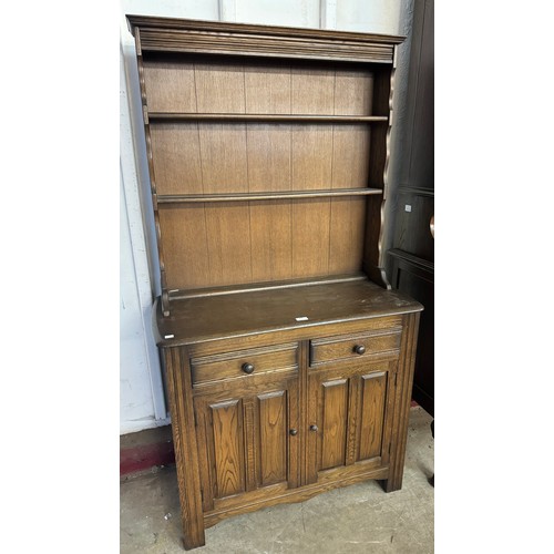 237 - A carved oak dresser