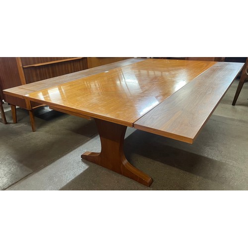 59 - A teak metamorphic coffee/dining table