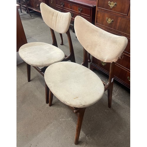 62 - A pair of Danish teak butterfly back side chairs