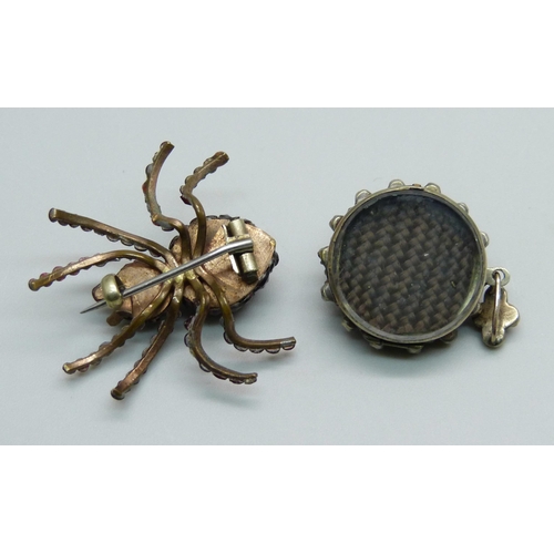 1001 - A Bohemian garnet spider brooch and locket