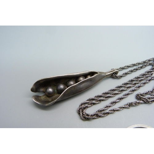 1009 - A vintage Modernist silver pendant and chain and one other marked VMK, 71g