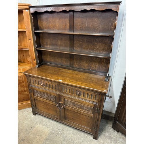 244 - A carved oak dresser