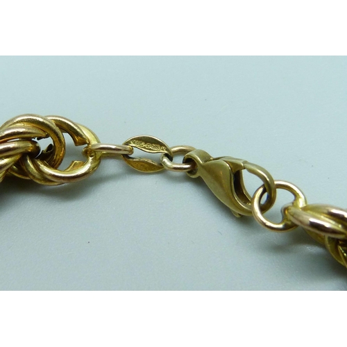 1025 - A 9ct gold rope chain necklace, 26.3g, 60cm