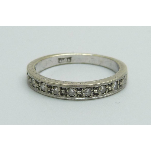 1028 - An 18ct gold ten stone diamond half eternity ring, 3g, L