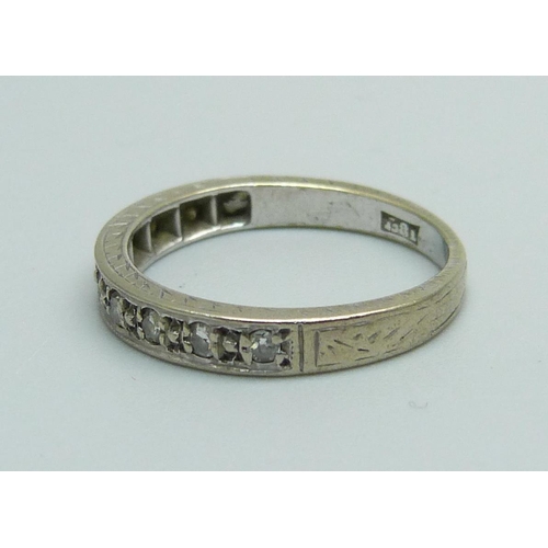 1028 - An 18ct gold ten stone diamond half eternity ring, 3g, L