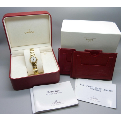 1041 - A lady's 18ct gold Omega wristwatch, 55614690, on an 18ct gold bracelet, 72.8g