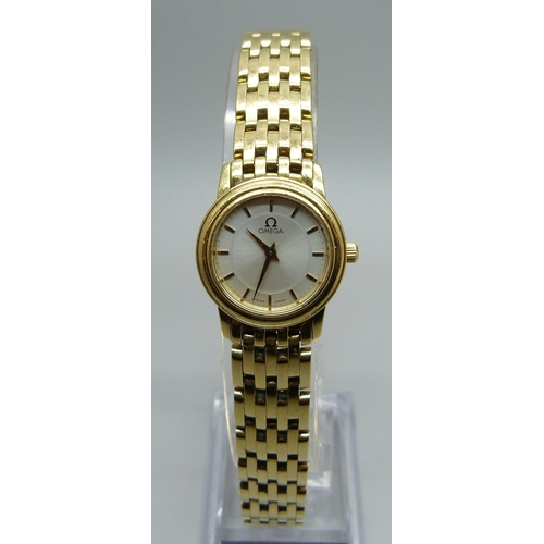 1041 - A lady's 18ct gold Omega wristwatch, 55614690, on an 18ct gold bracelet, 72.8g