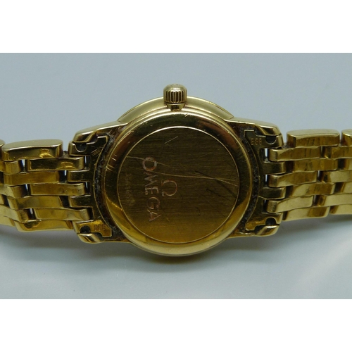 1041 - A lady's 18ct gold Omega wristwatch, 55614690, on an 18ct gold bracelet, 72.8g