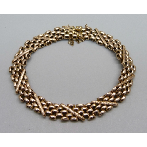 1054 - A 9ct gold bracelet, 14.7g