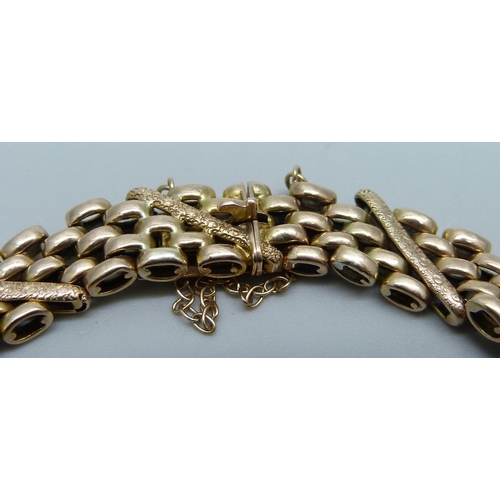 1054 - A 9ct gold bracelet, 14.7g