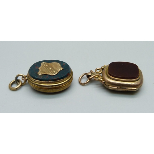 1060 - A locket with loop marked 9ct, 4.1g, a/f, and one other locket