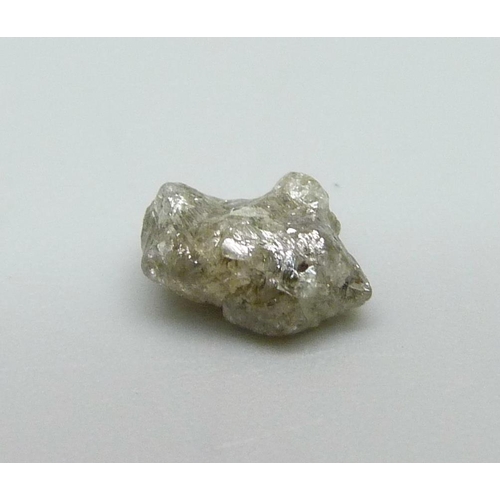 1061 - A rough uncut diamond, weight 1.25ct