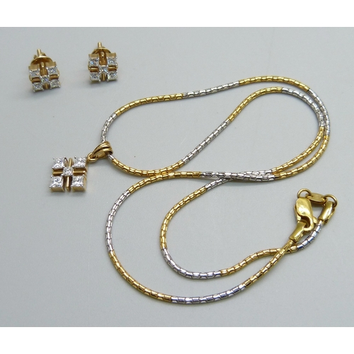 1063 - An 18ct gold and diamond pendant on a chain and a pair of similar earrings, with certificates, 1.27 ... 