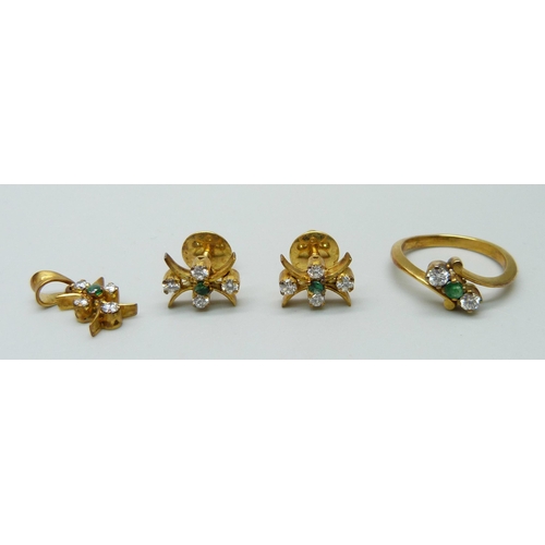 1064 - An emerald and diamond set jewellery suite, ring, earrings and pendant