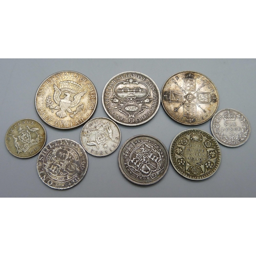 1067 - Nine silver coins; including a George III 1817 shilling, two Victorian coins, 1916 florin, an Austra... 