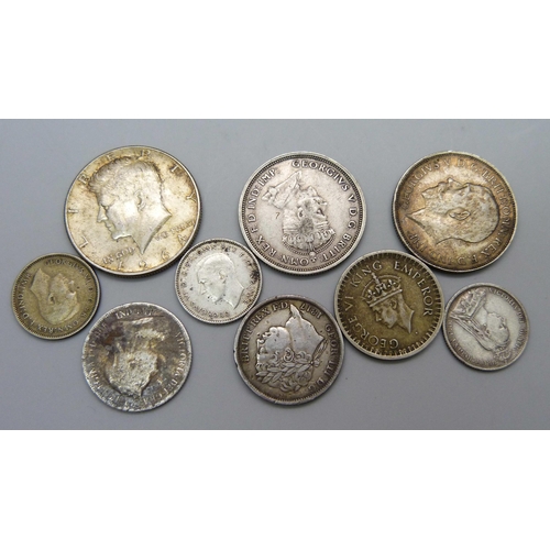 1067 - Nine silver coins; including a George III 1817 shilling, two Victorian coins, 1916 florin, an Austra... 