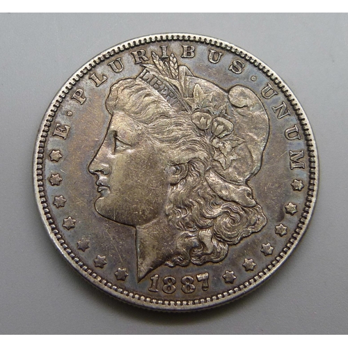 1073 - An American 1887 Morgan silver one dollar coin, 26.6g