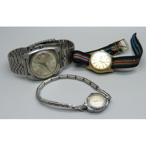 1090 - An Invicta 17 jewels wristwatch, a lady's Seiko day date quartz wristwatch and a lady's Union Specia... 