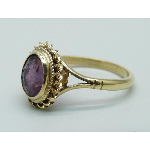 1098 - A 9ct gold amethyst ring, 2.2g, M