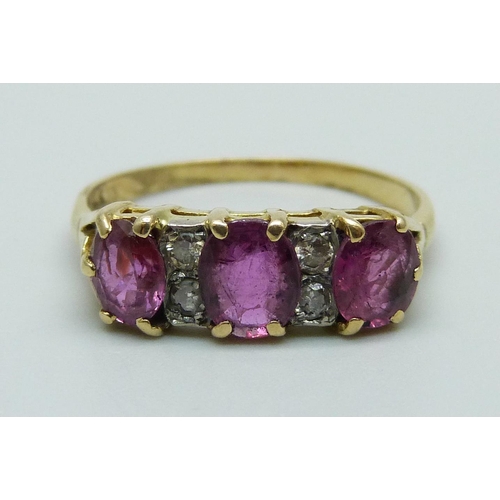 1100 - A ruby and diamond ring, marked 14K, 3.3g, S