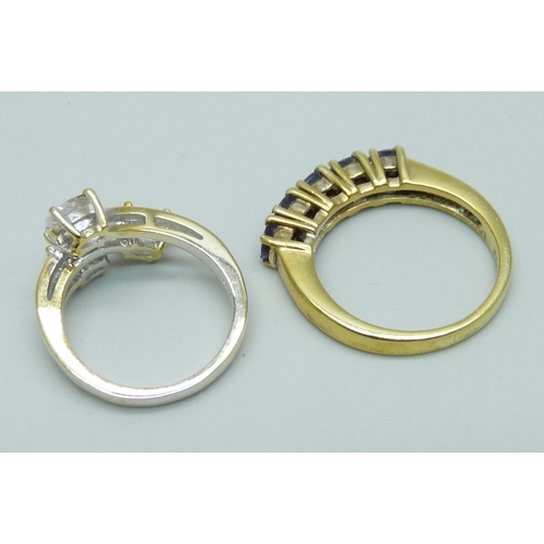 1111 - Two silver gilt rings, one set with tanzanite, J and P