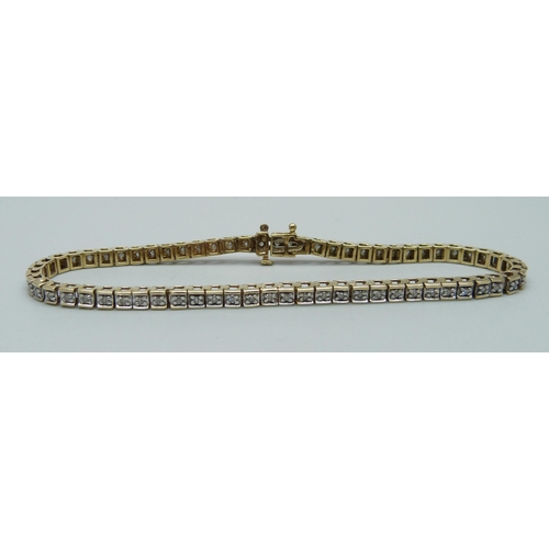 1120 - A 9ct gold and diamond set line bracelet, 10.3g, 19.5cm