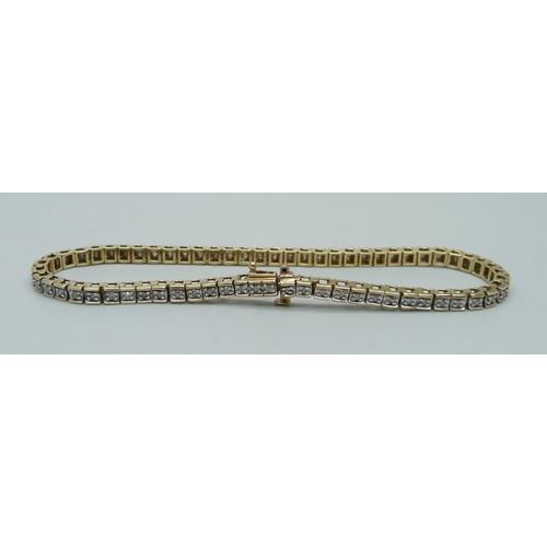 1120 - A 9ct gold and diamond set line bracelet, 10.3g, 19.5cm