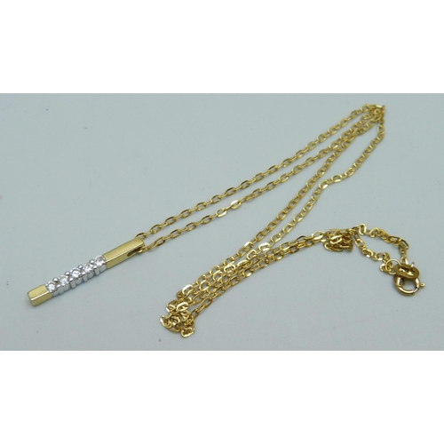 1127 - An 18ct gold five stone diamond pendant on an 18ct gold chain, 1.8g