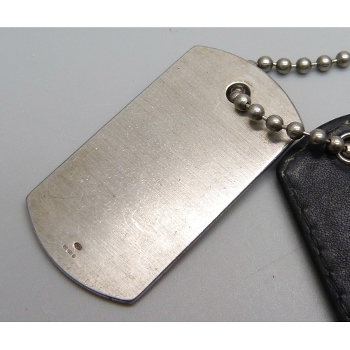 1135 - An Emporio Armani sterling silver dog tag neck chain, 37g