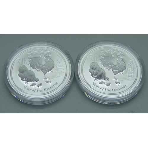 1142 - Two 1oz 9999 silver proof 2017 Year of the Rooster coins, Perth mint