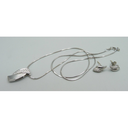 1145 - An 18ct white gold pendant on chain set with diamonds (approximately 0.15ct) and a pair of 9ct white... 