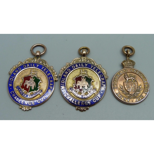 1149 - Three 9ct gold fob medals including one Army football medal, 27.8g