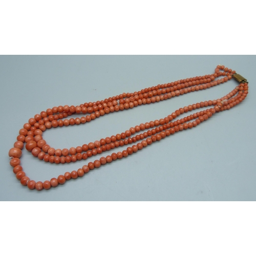 1152 - A three strand coral necklace, one string a/f