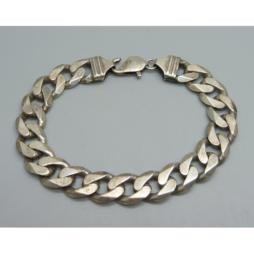 1162 - A silver curb link bracelet, 50g, fastener a/f