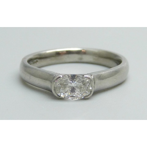 1164 - A platinum set diamond solitaire ring, approximately 0.5ct diamond weight, 6.8g, M