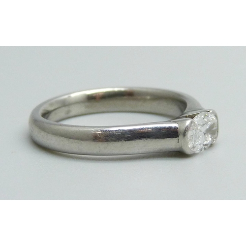 1164 - A platinum set diamond solitaire ring, approximately 0.5ct diamond weight, 6.8g, M