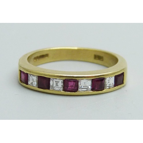 1169 - An 18ct gold, ruby and diamond ring, 3.3g, I