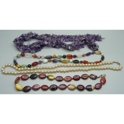 1178 - Four necklaces including amethyst with silver fastener