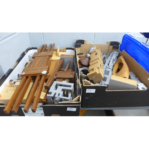 1201 - Two boxes of woodworking models, cast metal sculptures a handmade teak wall clock and other items **... 