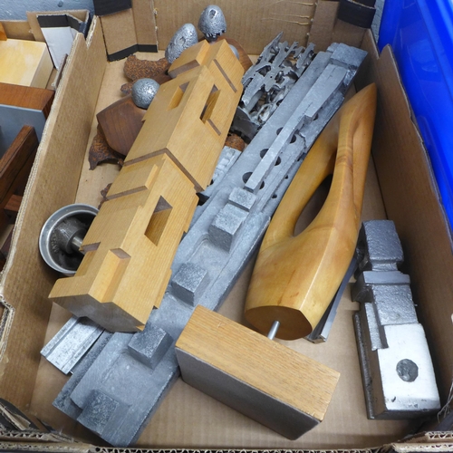 1201 - Two boxes of woodworking models, cast metal sculptures a handmade teak wall clock and other items **... 