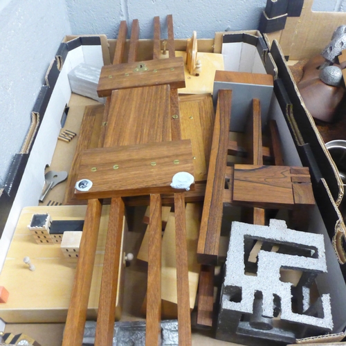 1201 - Two boxes of woodworking models, cast metal sculptures a handmade teak wall clock and other items **... 