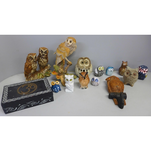 1243 - A collection of models of owls - ceramic, wood and glass