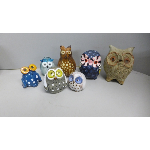 1243 - A collection of models of owls - ceramic, wood and glass