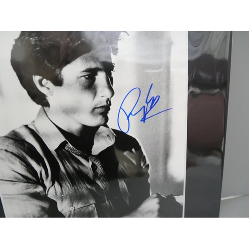 609 - A Richard Gere signed photograph, mounted