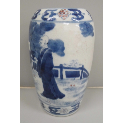 614 - A Chinese porcelain blue and white vase, decorated with figures, six character marks, crazed, lackin... 