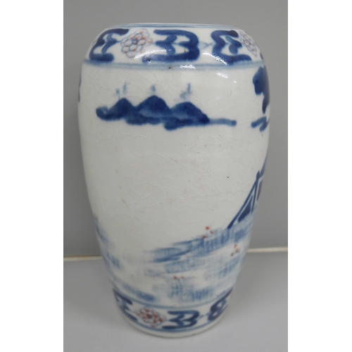 614 - A Chinese porcelain blue and white vase, decorated with figures, six character marks, crazed, lackin... 