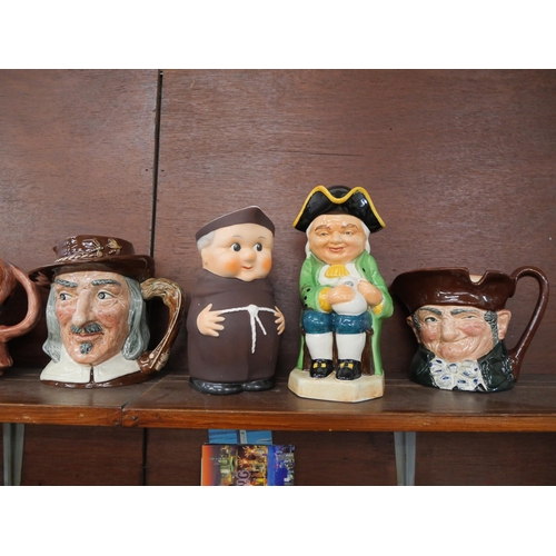 Seven Royal Doulton character jugs, two unmarked character jugs, one a ...